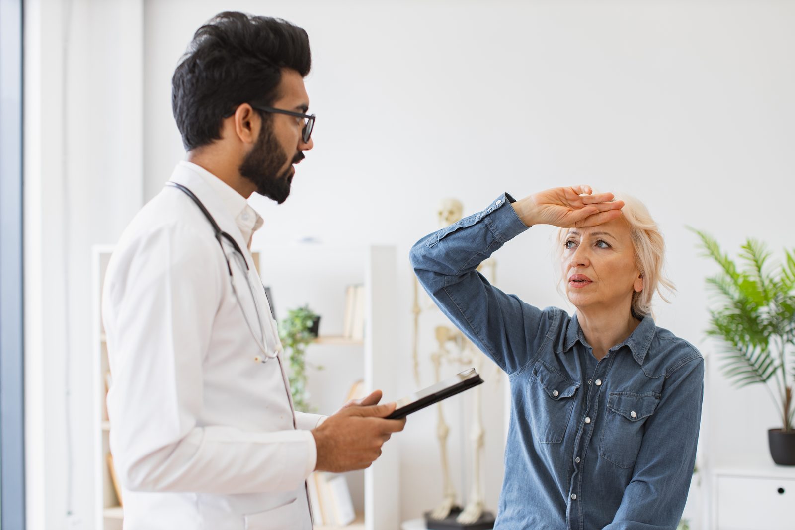 Primary ENT specialist examining a patient