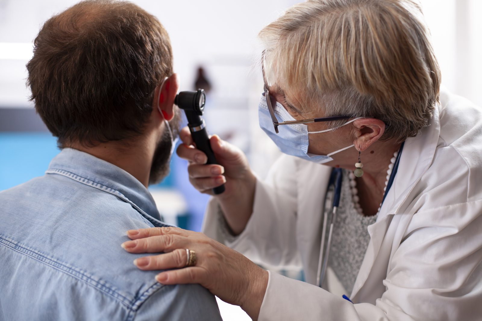 Primary ENT specialist examining a patient
